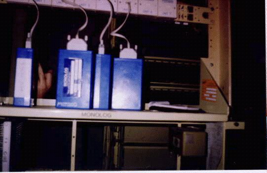 Multiple Mark I Monologs installed on a shelf in a telephone exchange